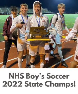  Soccer players standing with trophy